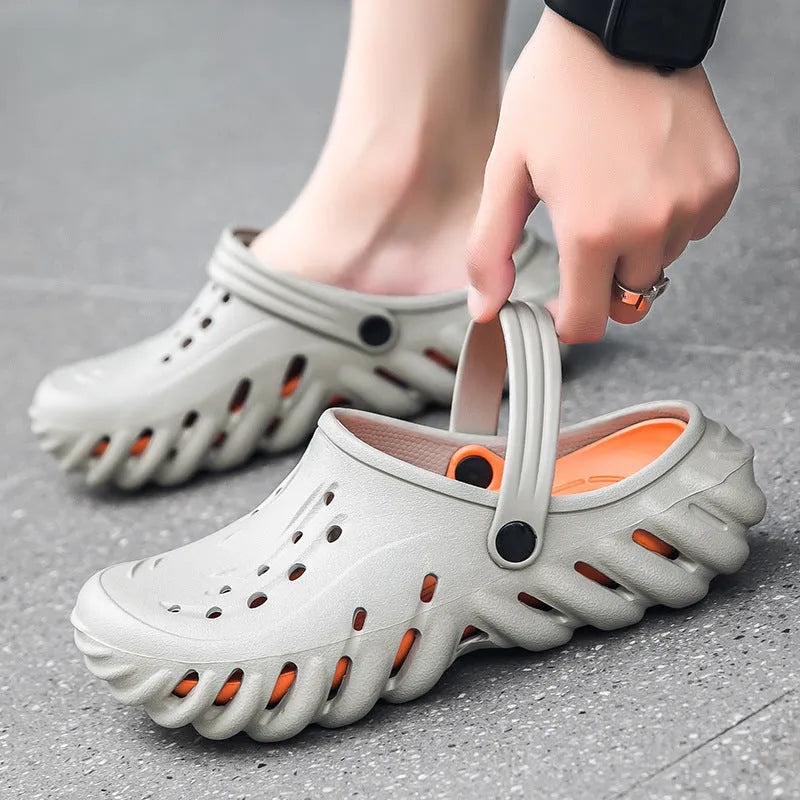 Men's beige EVA slipper sandals with a perforated upper and textured non-slip sole.