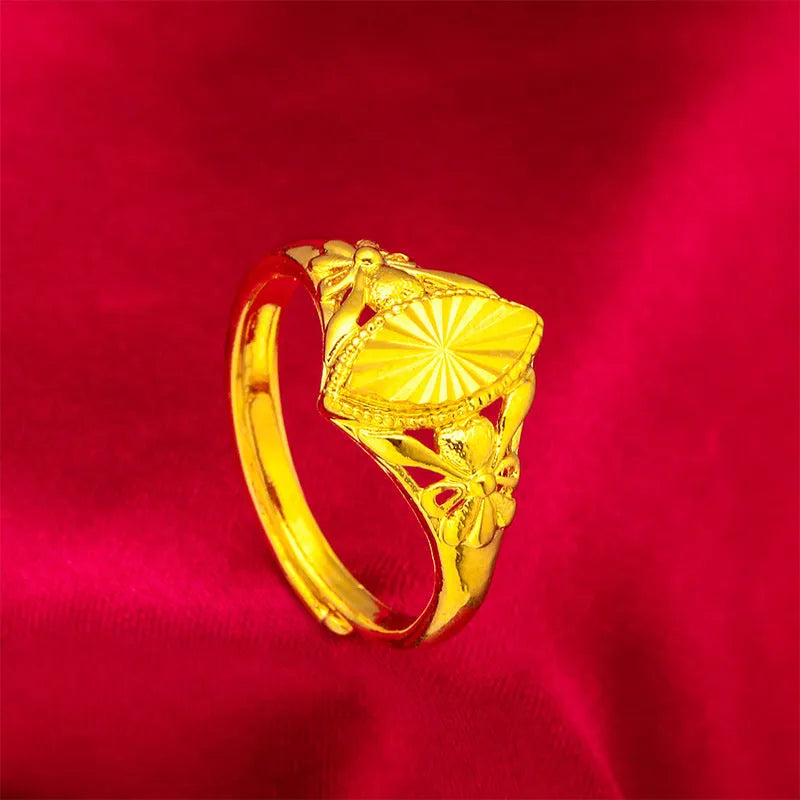 Alluvial gold coloured open diamond flower ring with geometric texture on brass metal
