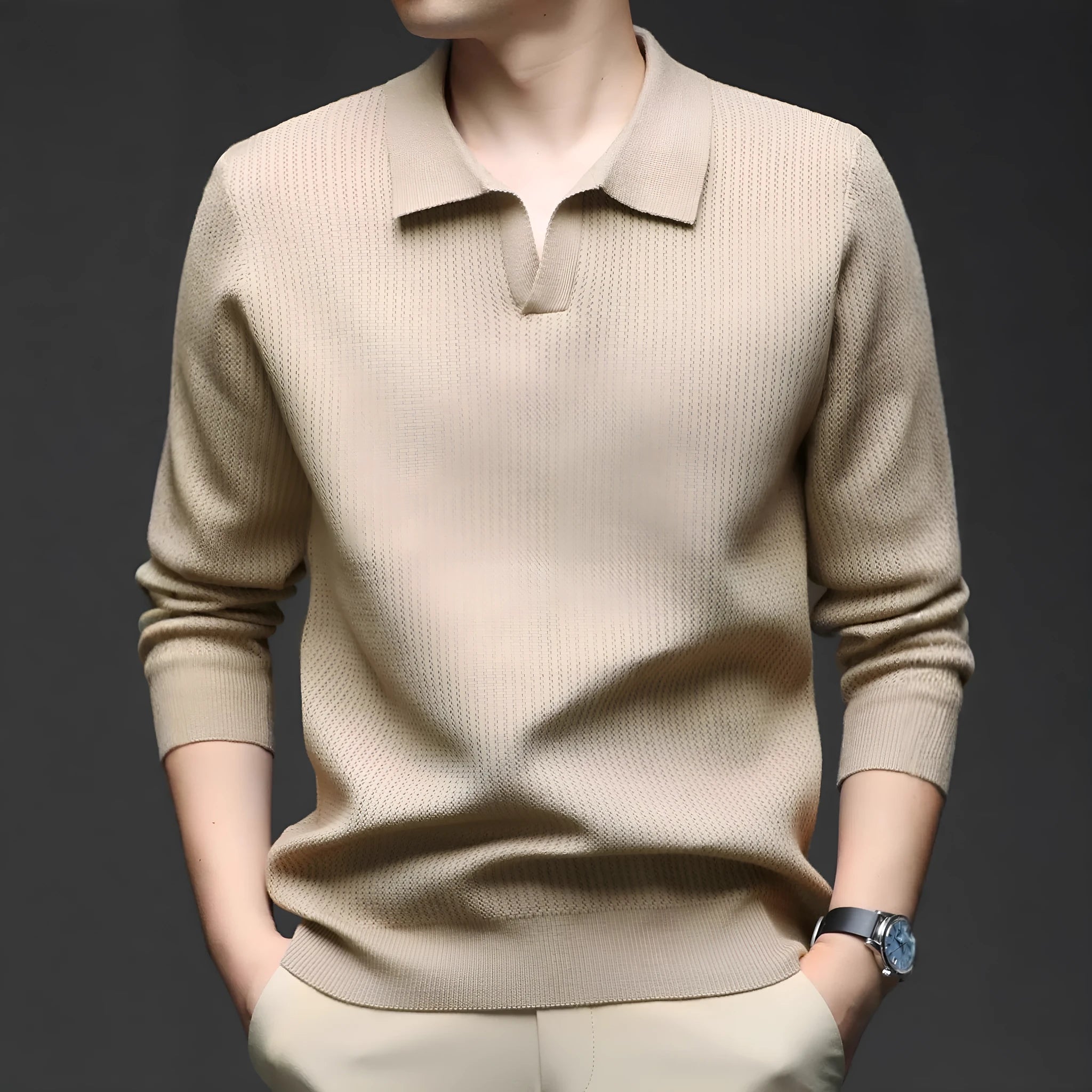 Man wearing a loose fit camel coloured casual pullover sweater.