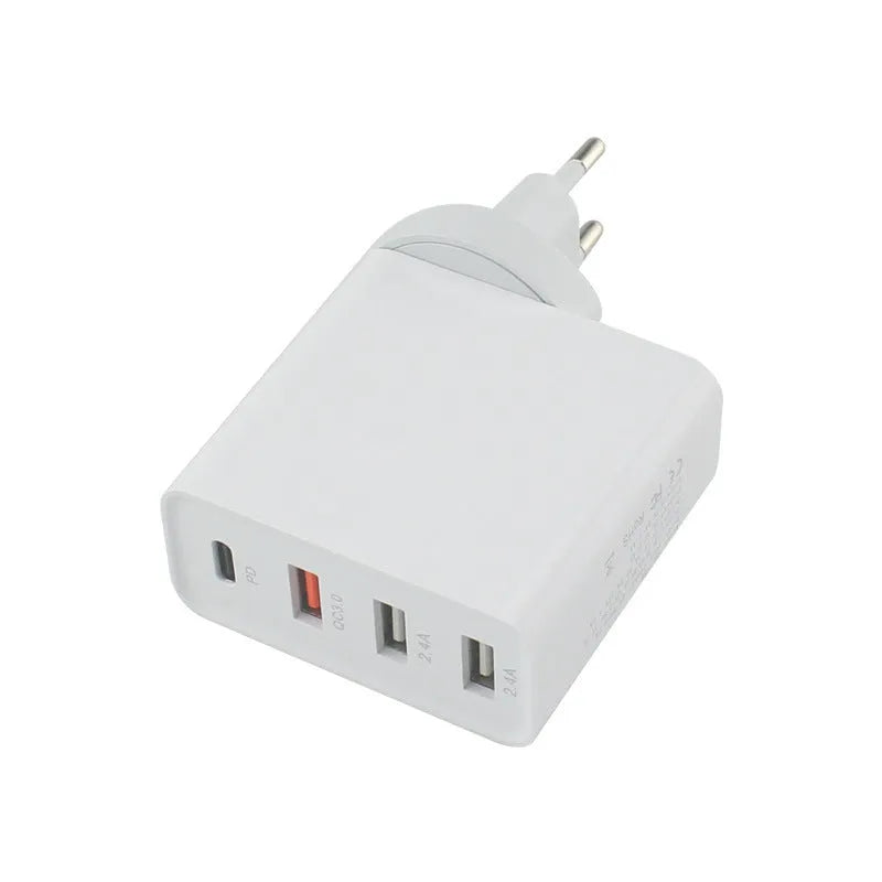 Black 48W USB C PD charger with four ports and a set of international plug adapters