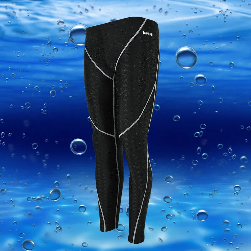 Men's black nylon cropped swimming trunks with grey line detail, brief style for sports