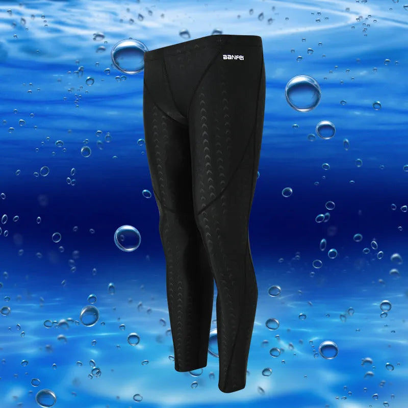 Men's black nylon cropped swimming trunks with grey line detail, brief style for sports