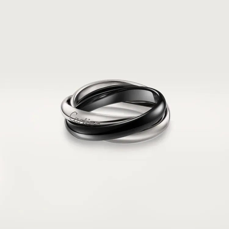 Geometric U-shaped sterling silver couple ring with three cubic zirconia stones on a hand, showing rose gold and black finish options.