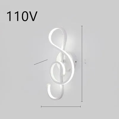 Nordic minimalist LED wall lamp with silicone shade in black finish on a white wall.