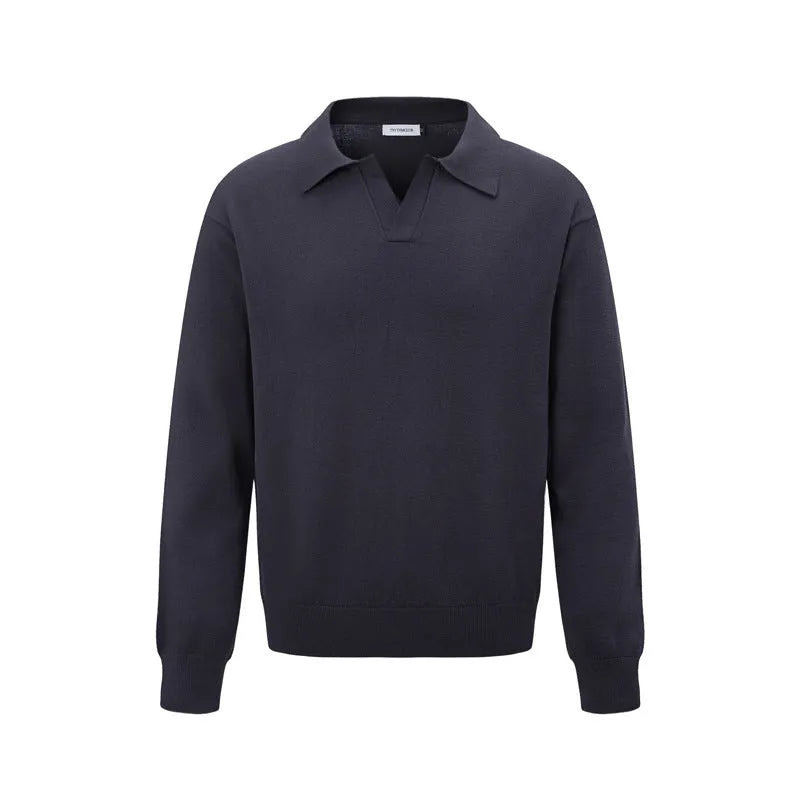 Man wearing a loose fit black acrylic pullover sweater for casual wear.