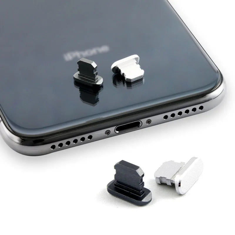 Aluminium alloy charging port dust plug for iPhone in various colours including gold, silver, blue, and black.