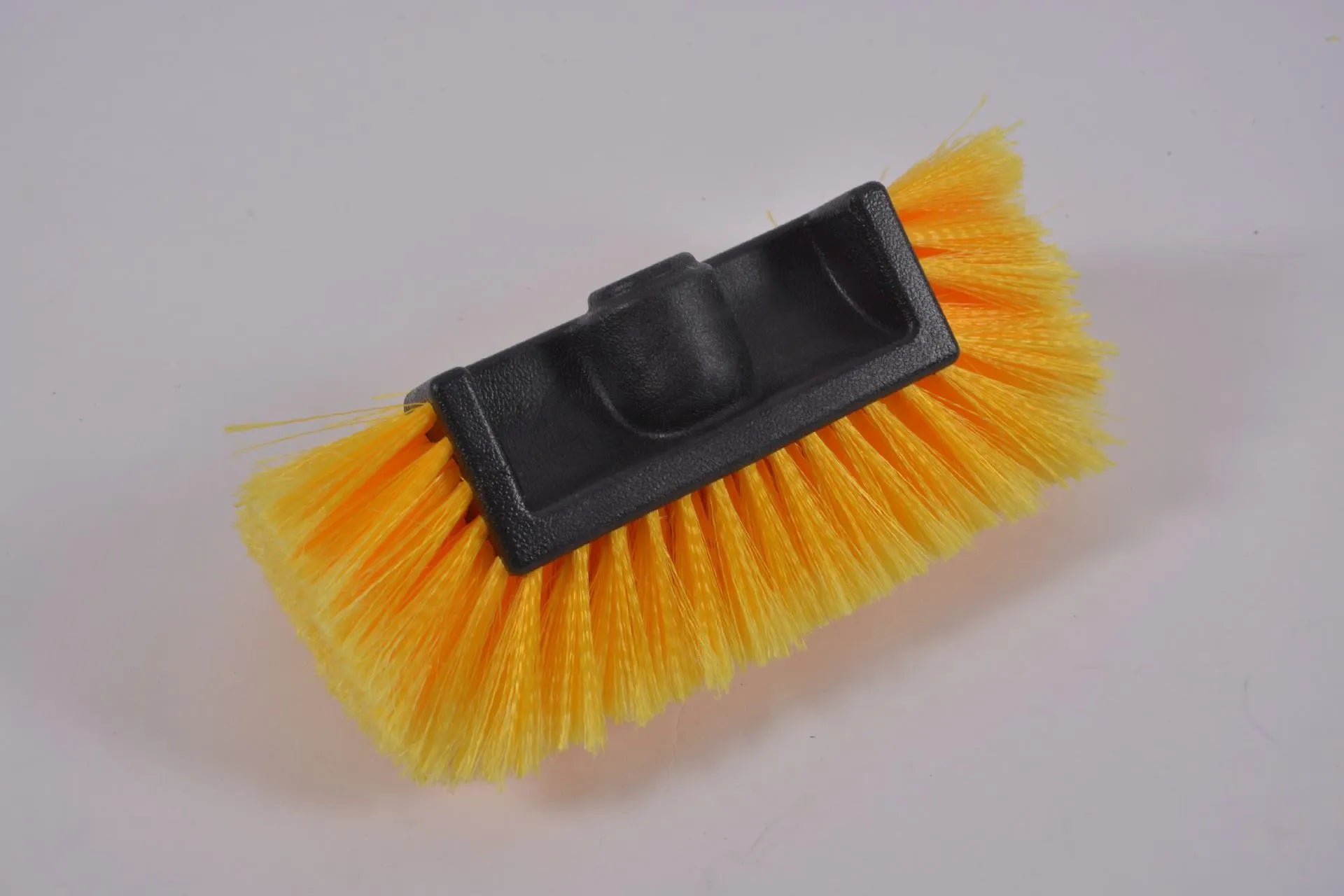 Yellow car wash brush with removable four-section rod and flow-through brush head design