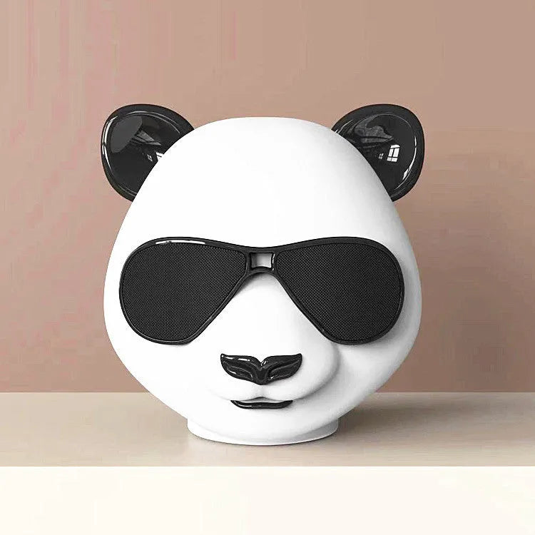 Compact classic-style portable mini Bluetooth speaker on a surface.