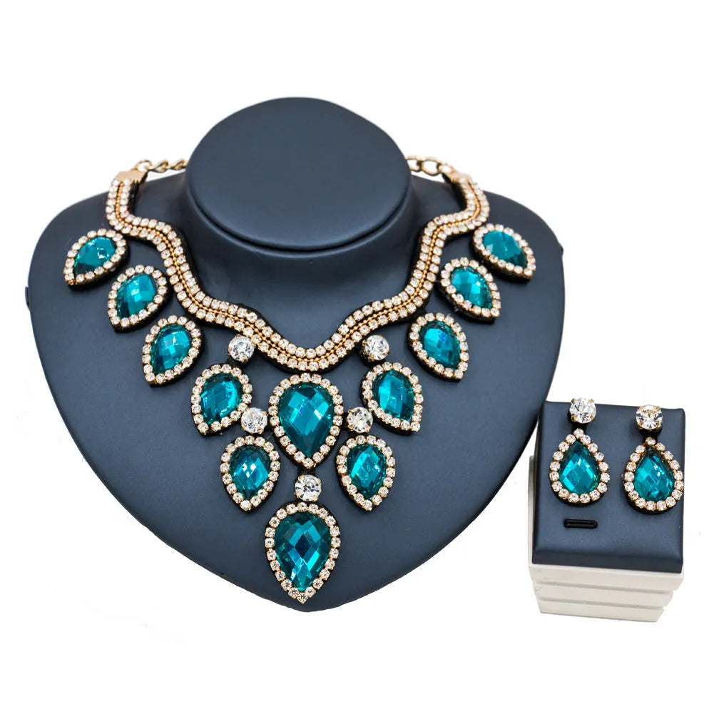 Exaggerated colourful bride necklace and earring set with gold base and colour accents