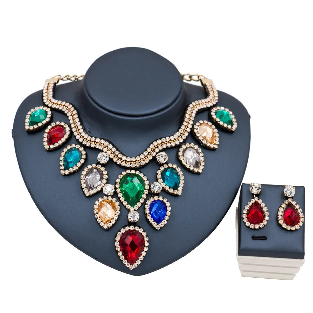 Exaggerated colourful bride necklace and earring set with gold base and colour accents
