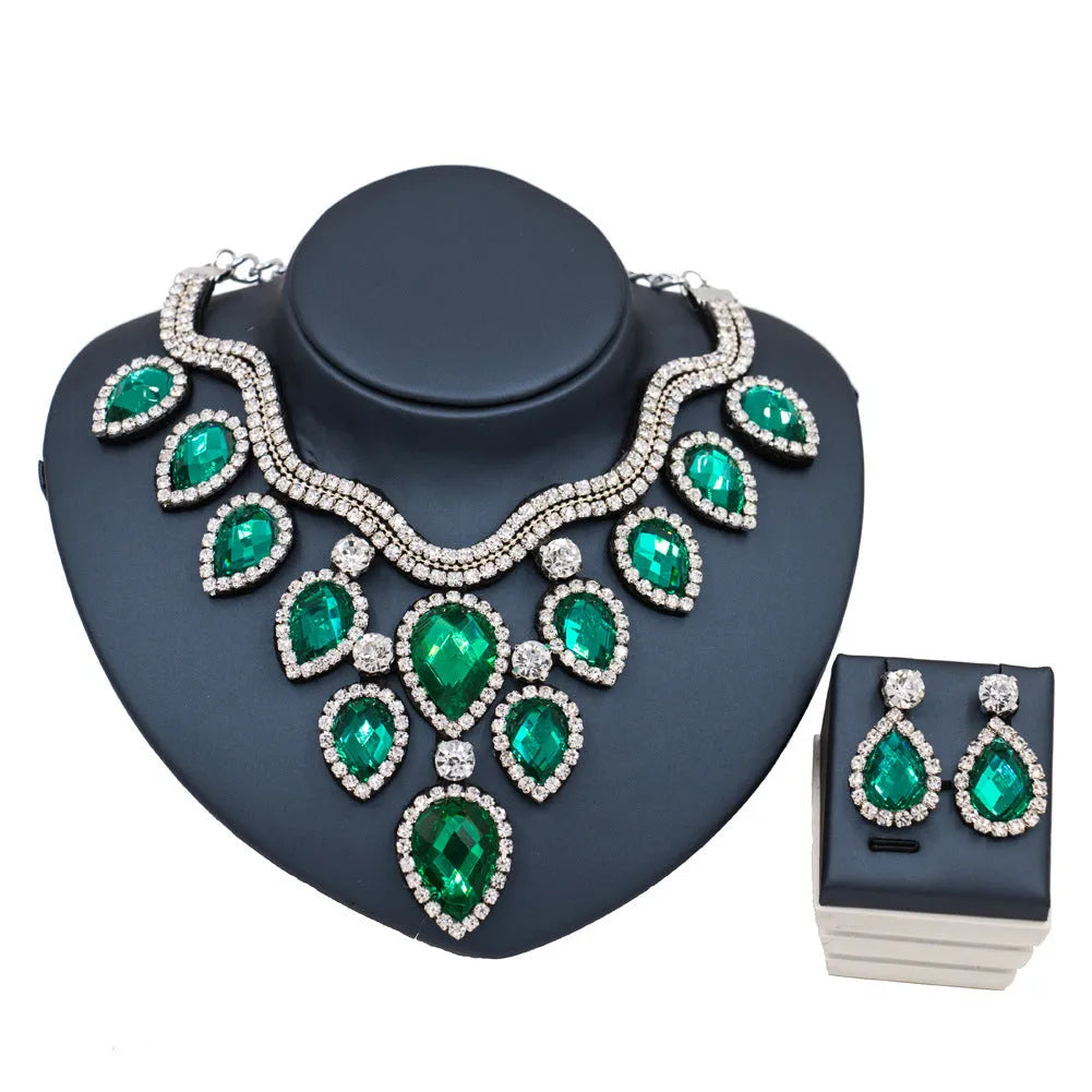 Exaggerated colourful bride necklace and earring set with gold base and colour accents