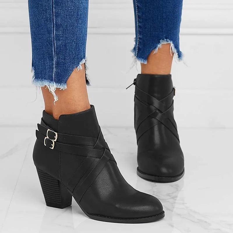 Plus size black short boot with side zipper, belt buckle, and a 7cm rubber heel