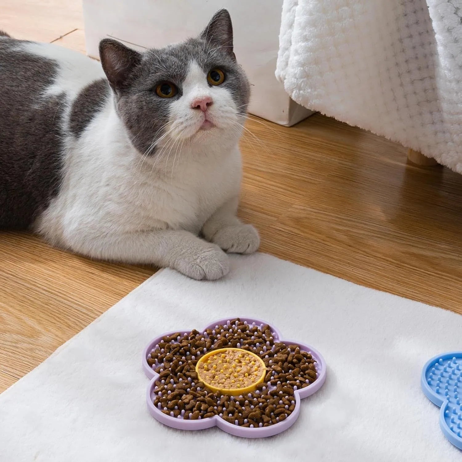 Grey flower-shaped silicone pet lick mat with suction cups for slow feeding