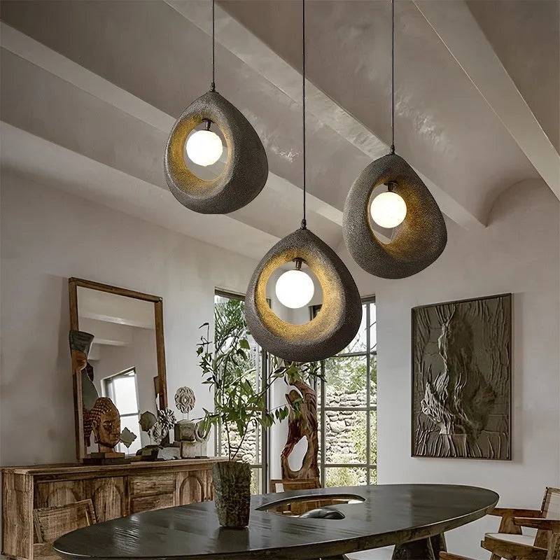 Retro modern chandelier with milky white shade hanging as pendant light