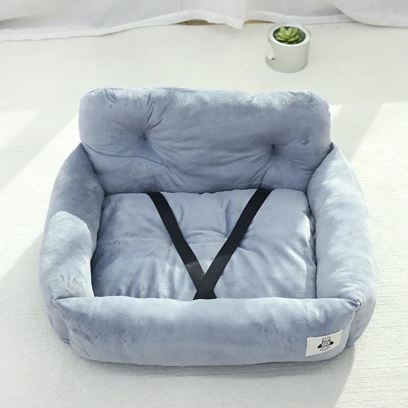 Grey and blue plaid cloth dog bed designed for car travel, shown in small and large sizes.