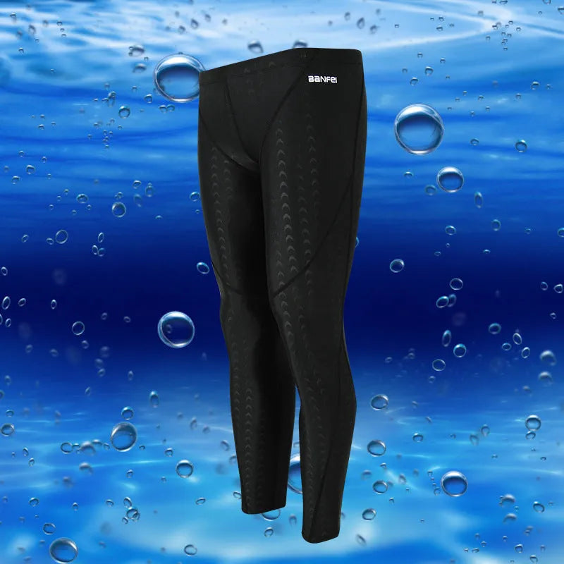 Men's black nylon cropped swimming trunks with grey line detail, brief style for sports