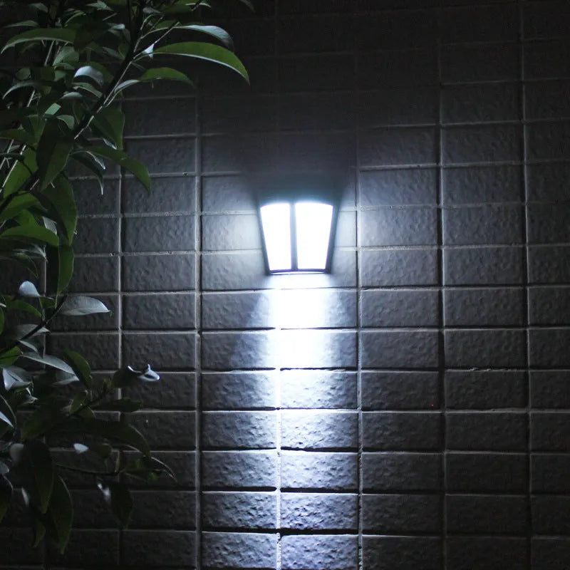 Solar-powered outdoor wall lamp with 6 LEDs for garden and pathway lighting
