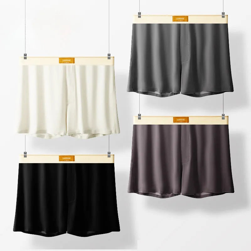 Men's solid colour ice silk underwear with a loose fit and mid waistband on a neutral background.