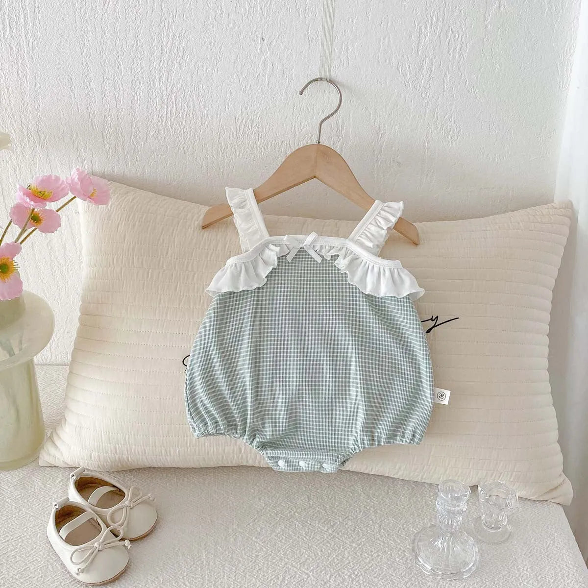 Girls light green striped sleeveless cotton jumpsuit for 66-90cm height with ruffle neckline
