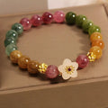 Natural colour tourmaline bracelet with flower design and electroplated finishing