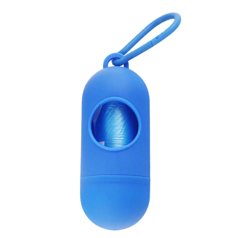 Black plastic dog poop bag dispenser with Velcro strap and a side metal hook.