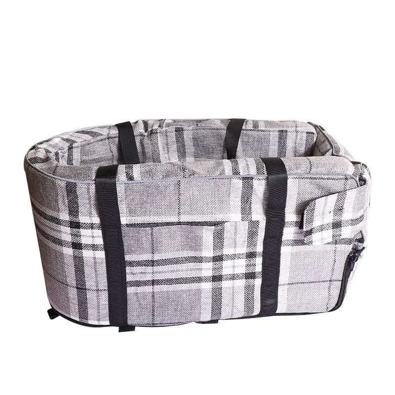 Portable grey cloth dog kennel for outdoor and car travel use.