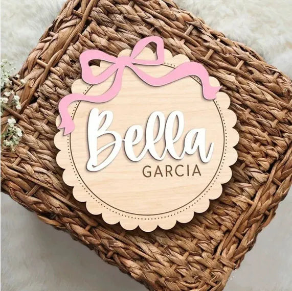 Square wooden baby room ornament with custom name engraving for nursery decor.