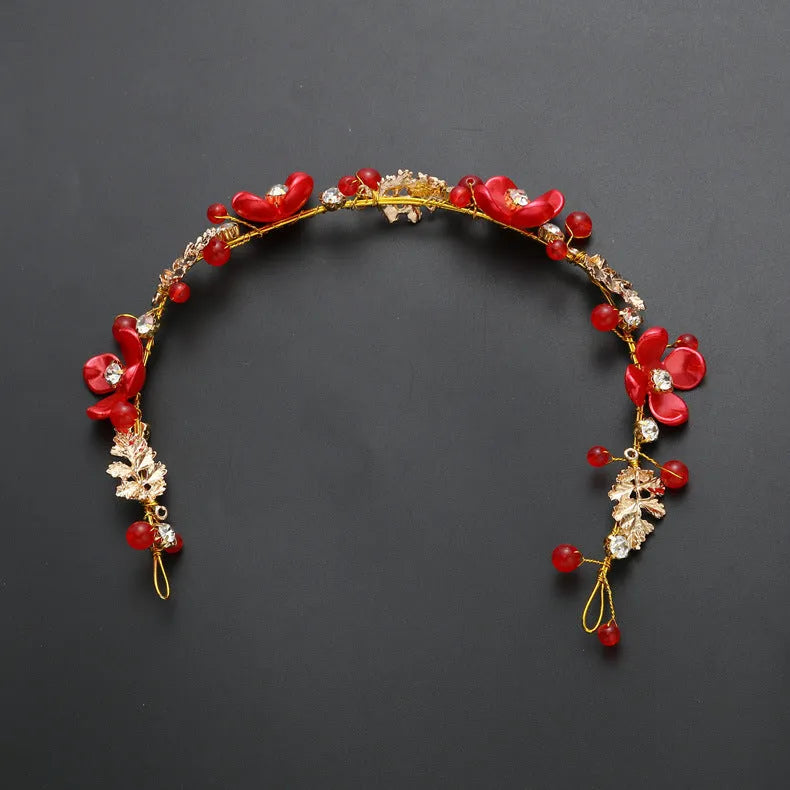 Costume jewellery set with bride headdress and hair ornaments featuring rhinestone and pearl details on gold metal
