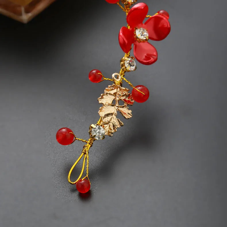 Costume jewellery set with bride headdress and hair ornaments featuring rhinestone and pearl details on gold metal
