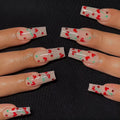 Set of 24 red cherry and diamond shaped nail art decorations for French manicure designs.