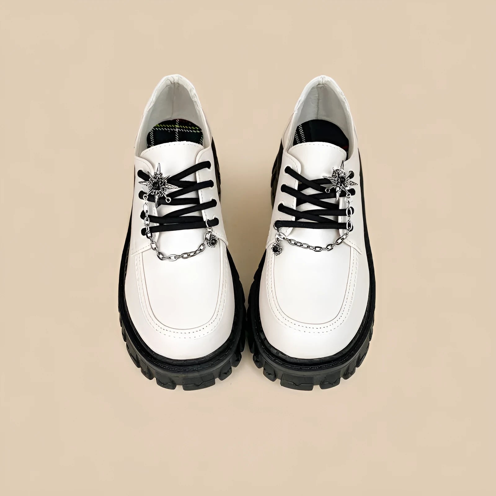 Women's Duke Asterism colour loafers with a metal cross shoulder strap and round toe.