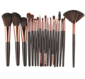 MAANGE 18-piece makeup brush set featuring fan-shaped brushes and various other styles on a white background.