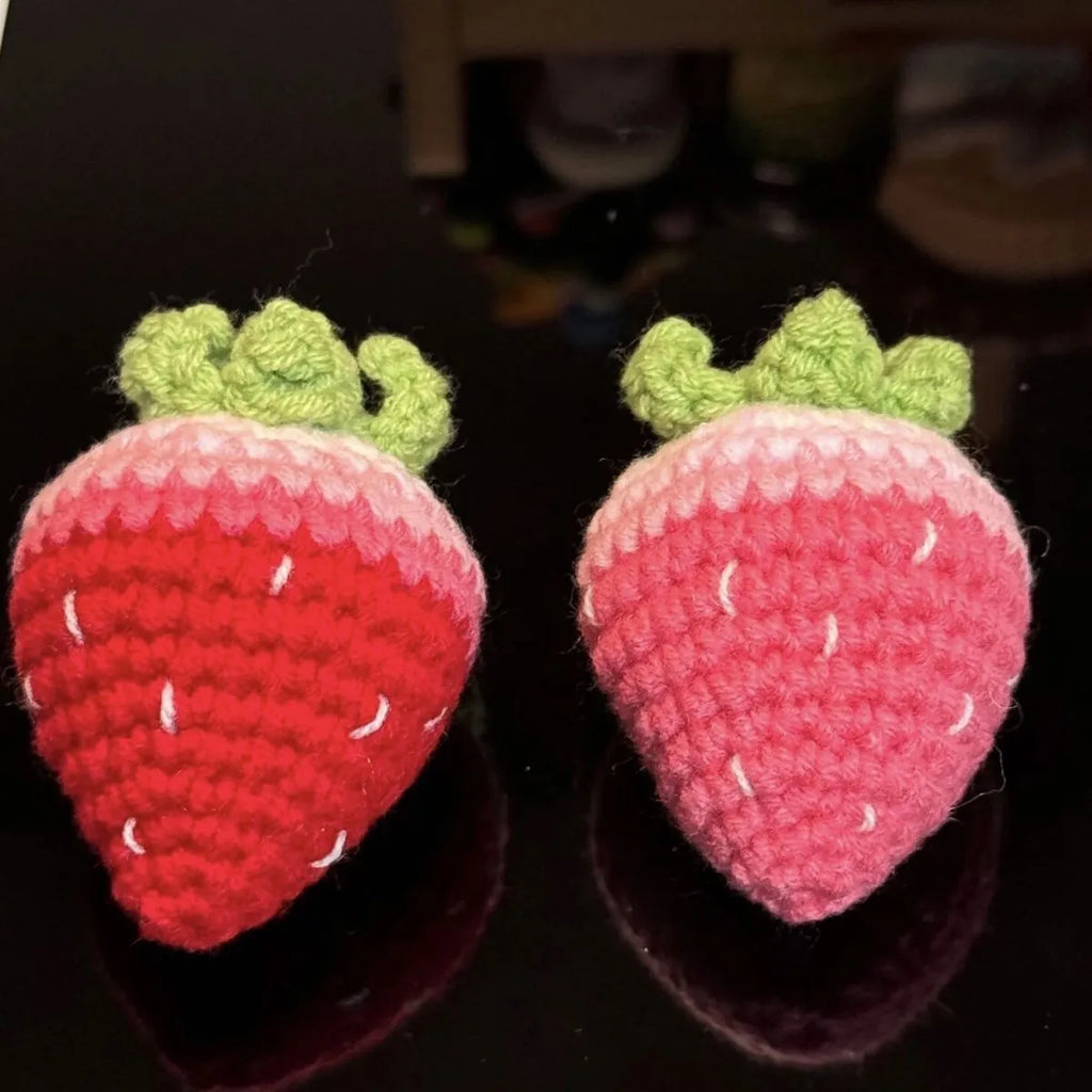Plush wool strawberry pendant keychain charm in pink or red colour.