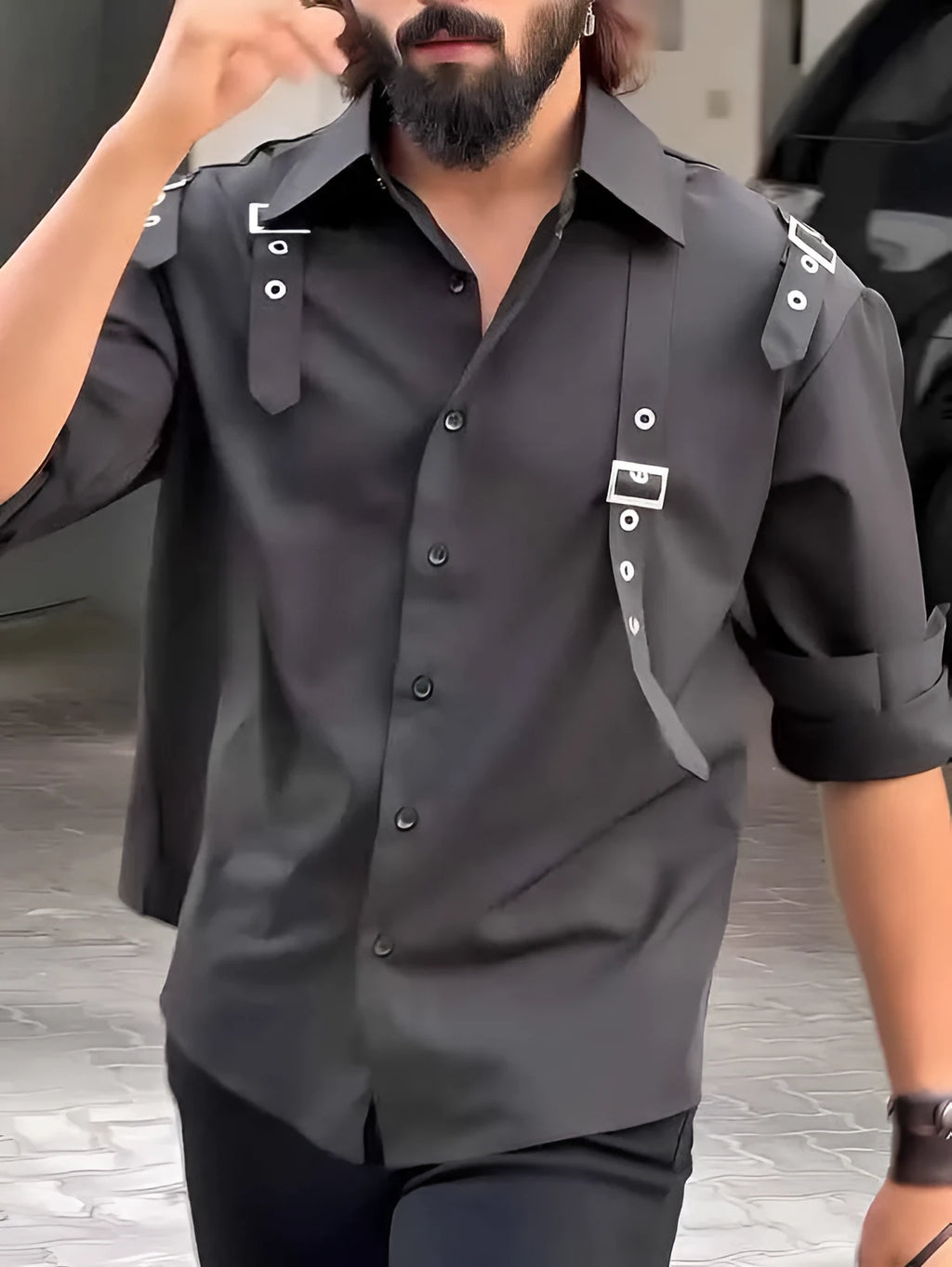 Men's black utility style button-up shirt with a regular fit on a hanger.