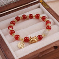 Women's floral glazed bracelet with animal zodiac motifs on coloured glass beads in red, pink, and white variants