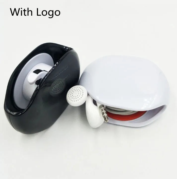 Automatic plastic cable winder retractor showing black, blue, and red units next to a coiled earphone cable.