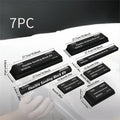 Seven black EVA frosted building blocks with metal connectors for construction and modelling