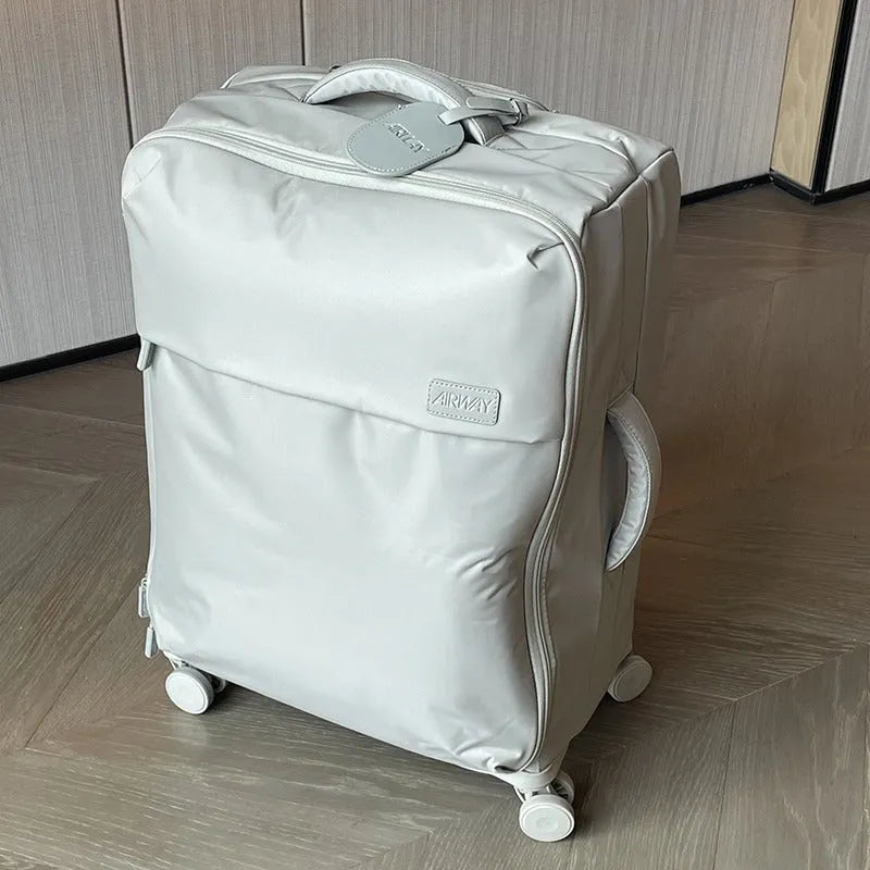 Ultra-light waterproof Oxford cloth suitcase with universal wheels in bluestone green colour