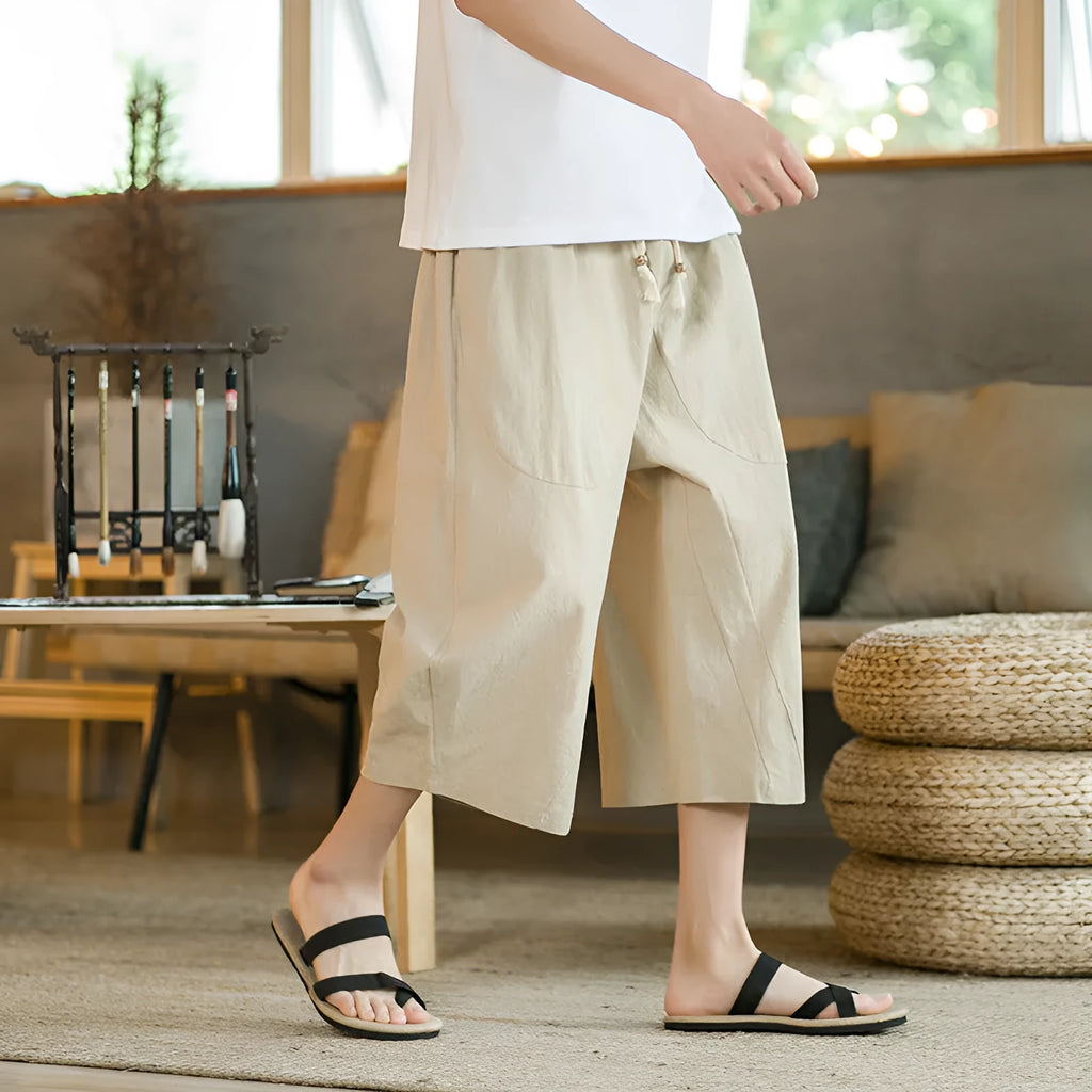 Women's plus size linen summer shorts in straight leg skinny fit, shown in khaki colour.