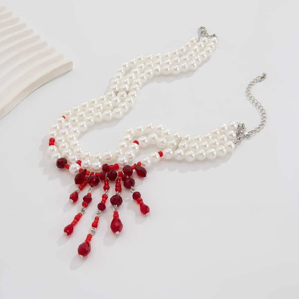 Men's Halloween necklace with blood drop crystal pendants, pearl beads, and tassel on adjustable chain