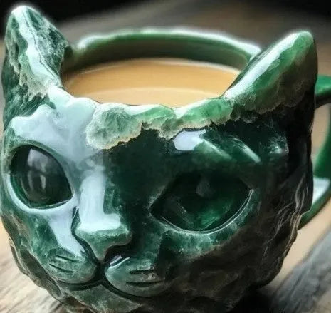 Purple handmade resin mug with a geode crystal design and a cat sculpture on the side.