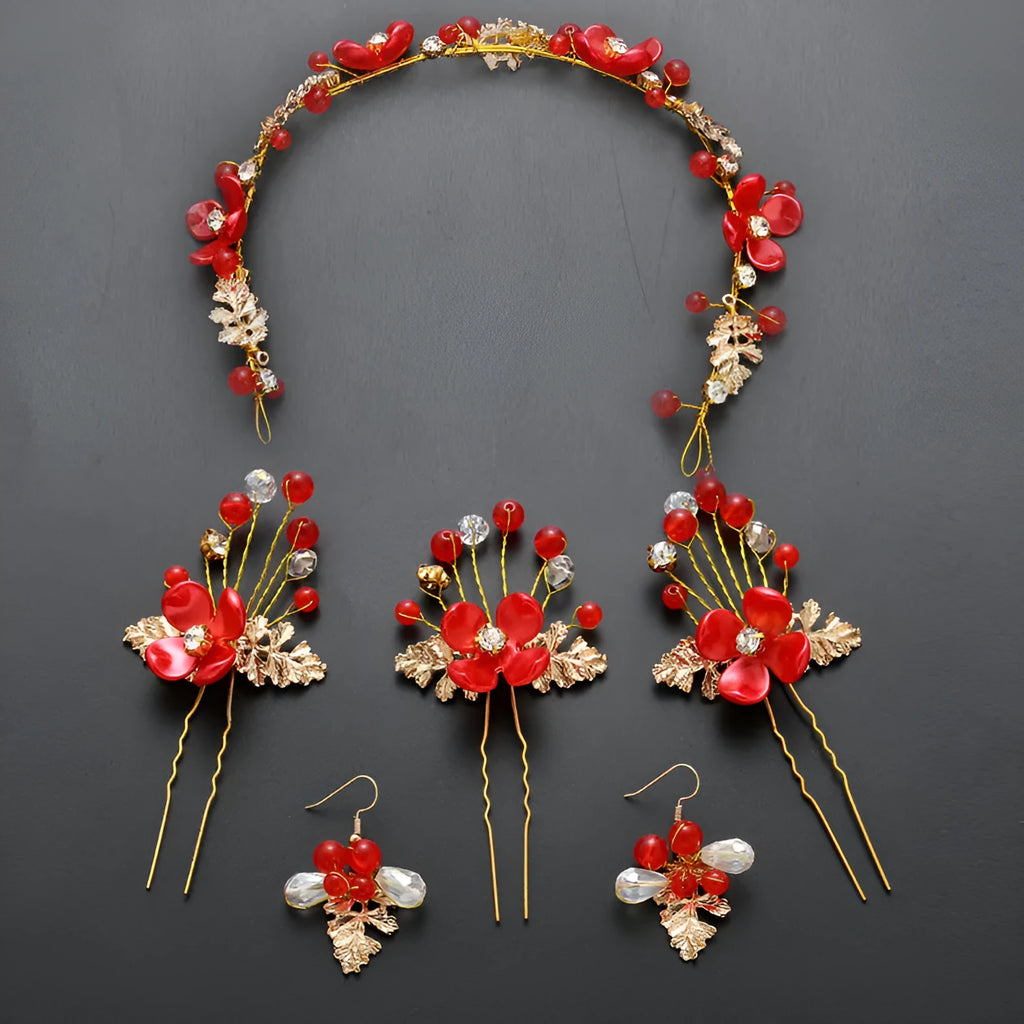 Costume jewellery set with bride headdress and hair ornaments featuring rhinestone and pearl details on gold metal