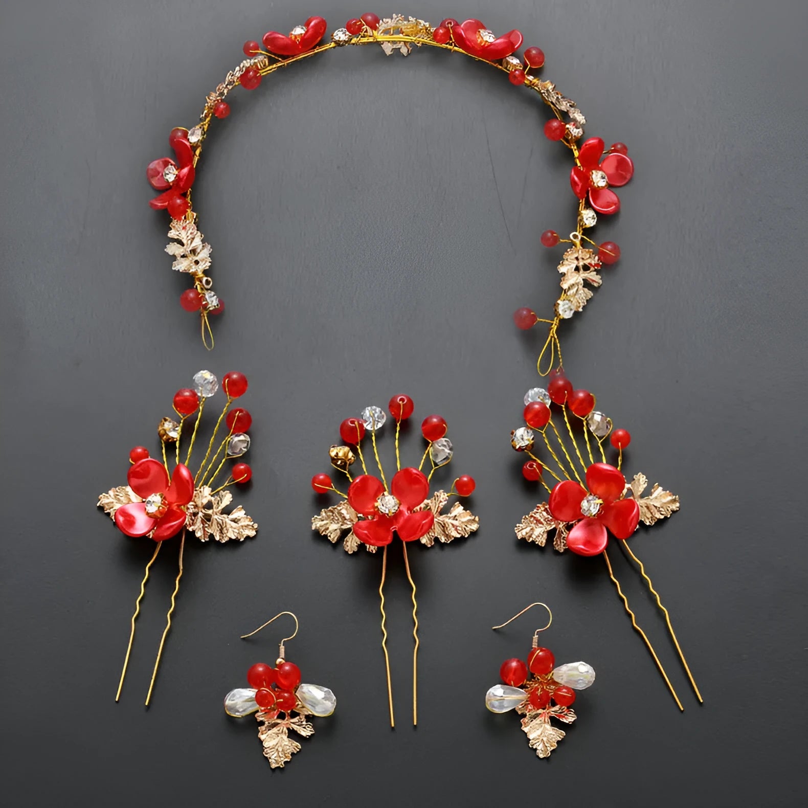 Costume jewellery set with bride headdress and hair ornaments featuring rhinestone and pearl details on gold metal