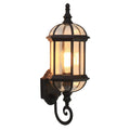 Gold and black outdoor aluminium wall lamp with a three-layer, eight-inch waterproof design.