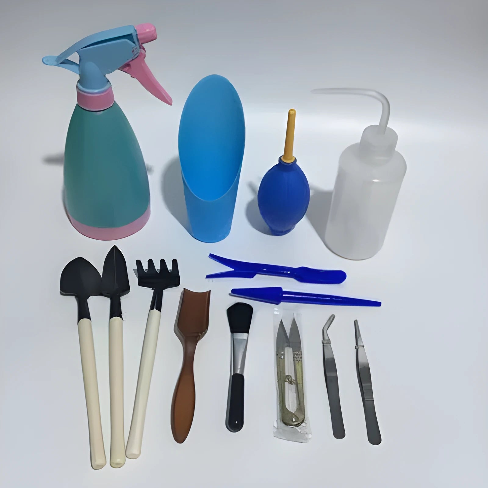 14-piece succulent gardening tool set showing watering can, drip kettle, mini shovel, rake, tweezers and transplanting tools