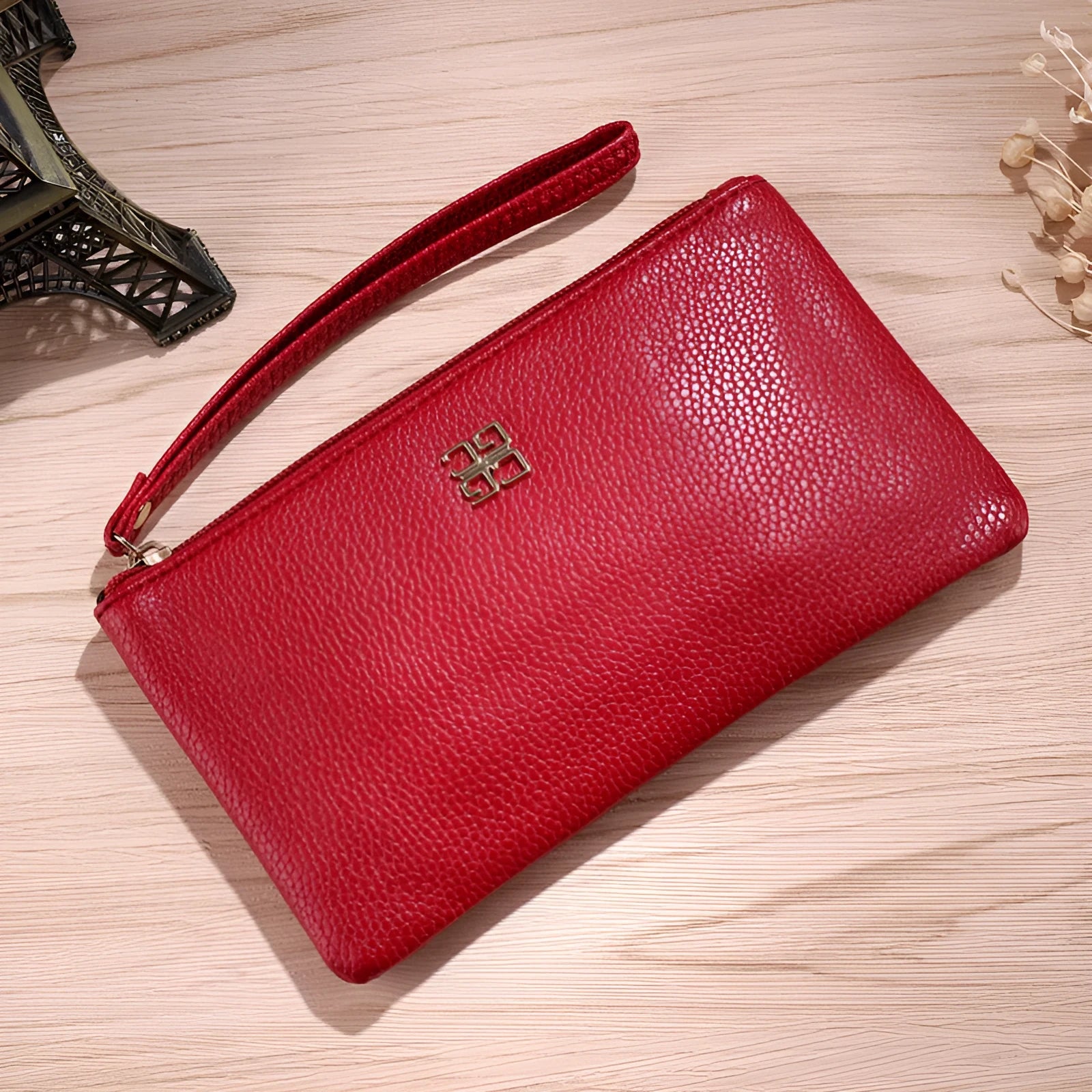 Long slim wine red PU leather wallet handbag with a top zip, shown open to reveal card slots and a phone pocket.