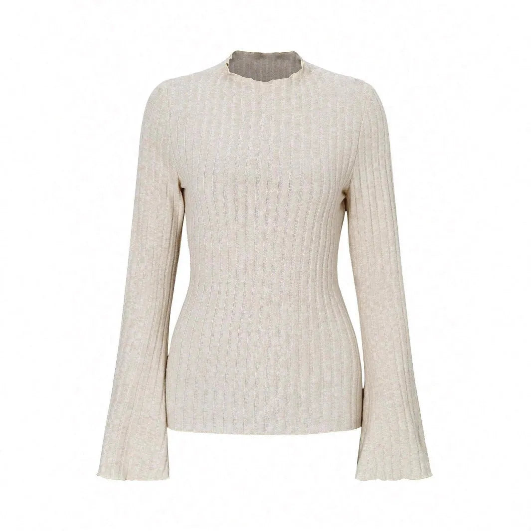 Long sleeve black top with lantern sleeves and sunken stripe texture, laid flat.