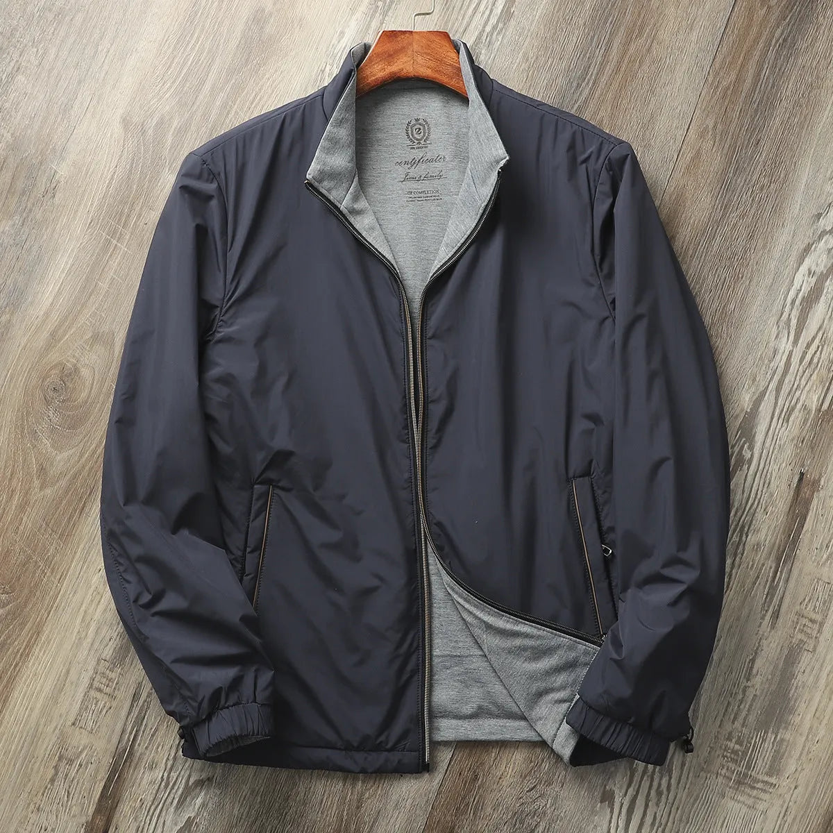 Men's simple stand collar jacket in a polyester-cotton blend, shown in one of four available colours.