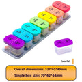 White and rainbow coloured portable pill box dispenser with 14 removable compartments shown open.