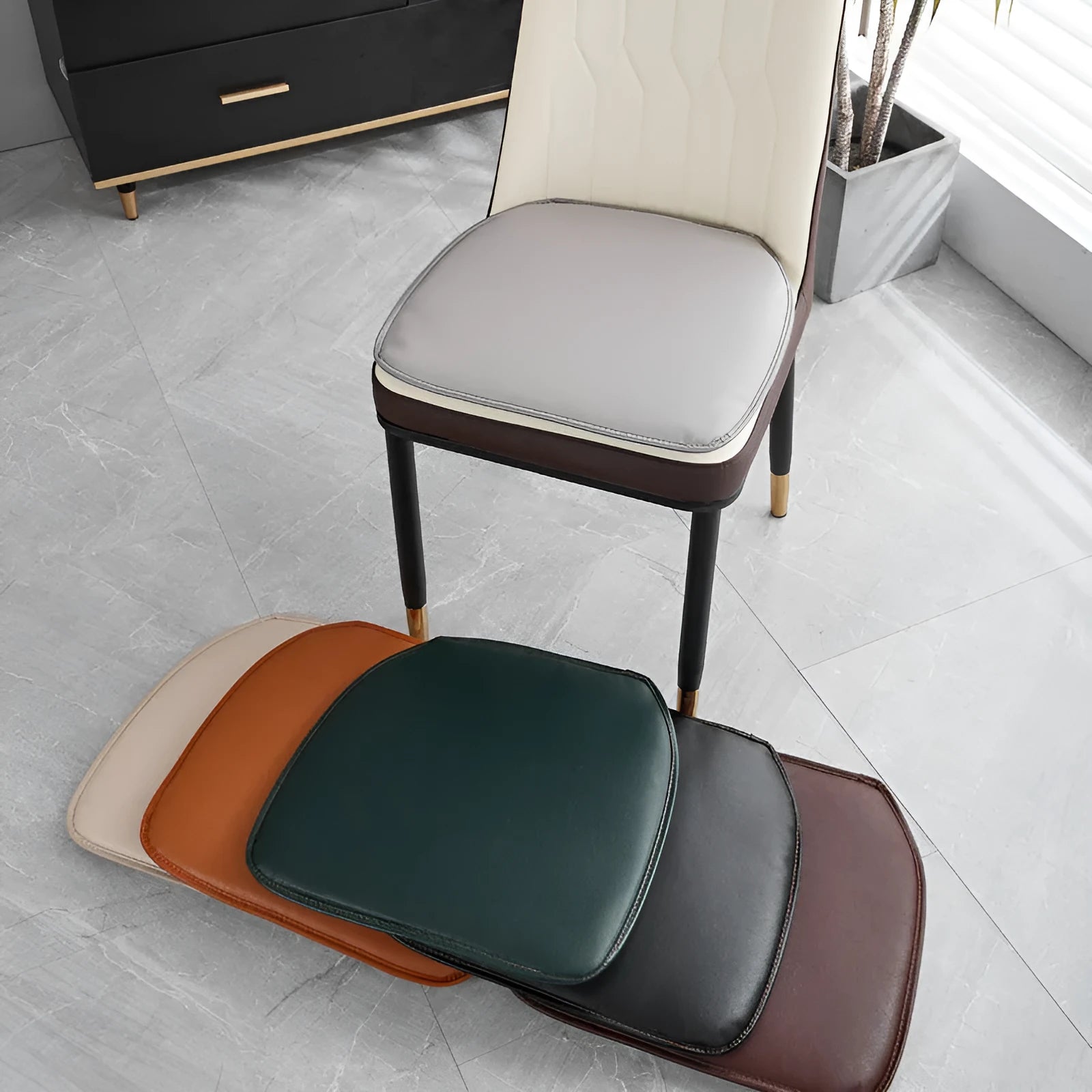 Leather horseshoe-shaped seat cushion in beige colour showing thickness and shape